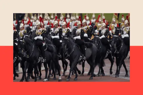 Jonathan Brady - WPA Pool/Getty Images Members of the Mounted Household Cavalry gather on The Mall ahead of the Ceremonial Welcome for President of South Korea, 2023 in London

