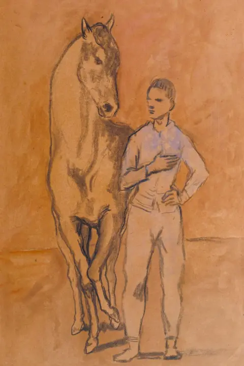 Tate/Succession Picasso DACS, London 2025 A traditional sketch of a horse and a boy, the boy is wearing a blue shirt. 