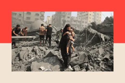 MAHMUD HAMS/AFP via Getty Images Palestinians evacuate the area following an Israeli airstrike on the Sousi mosque in Gaza City 