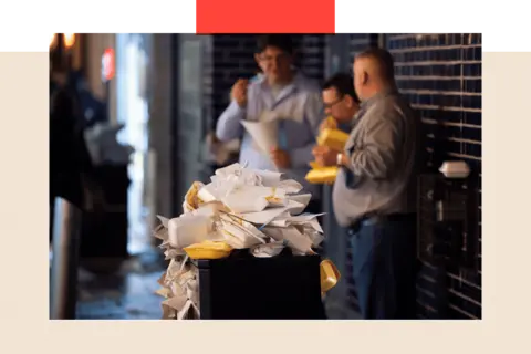 Getty Images Bin overflowing with junk food packaging