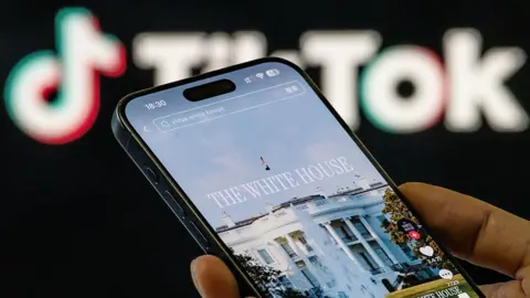 Getty Images In this photo illustration, a smartphone screen displays a video of the White House on TikTok after the US presidential office launched its official account on the short-video platform