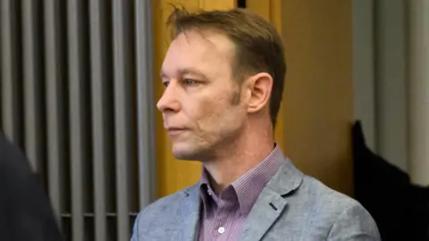 Reuters Christian Brückner, a suspect in the disappearance of British toddler Madeleine McCann in Portugal, stands trial in Germany on unrelated sexual assault charges in Braunschweig, Germany, February 16, 2024.