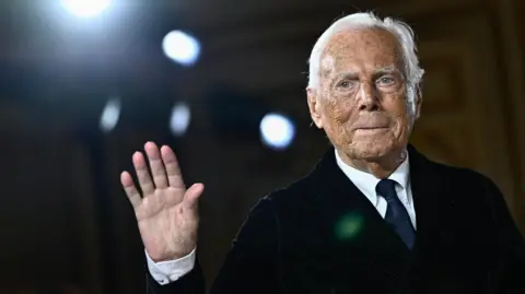 Getty Images Giorgio Armani waving