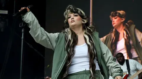 Getty Images Lola Young performs at the 2025 All Things Go NYC at Forest Hills Stadium 