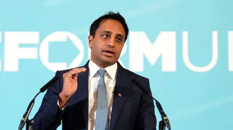 PA Media Head of policy Zia Yusuf speaking during a Reform UK press conference at the Royal Horseguards Hotel, London. Picture date: Monday September 22, 2025. PA Photo.