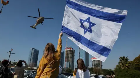 Reuters helicopter carrying freed hostage arrives at Rabin Medical Center in january 2025