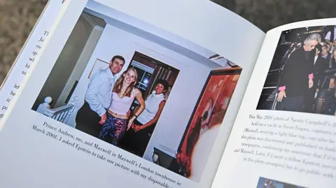 Nobody's Girl - A Memoir of Surviving Abuse and Fighting for Justice" by Virginia Roberts Giuffre is open on the page showing her as a teenager next to Prince Andrew, with Ghislaine Maxwell in the background. 