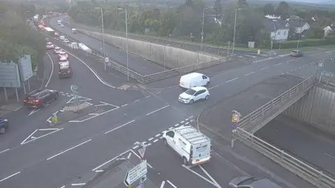 Traffic Wales Vehicles can be seen queuing around the Britannia Bridge, in this image taken from a traffic camera.