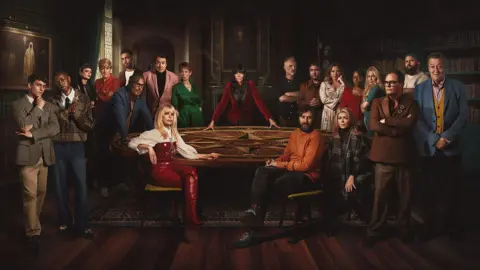 BBC/PA A picture of the Celebrity Traitor contestants with Claudia Winkleman