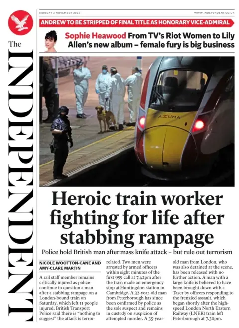 The headline on the front page of the Independent reads: "Heroic train worker fighting for life after stabbing rampage."