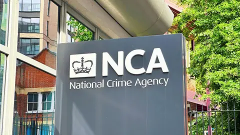 Getty Images Sign at the entrance to the National Crime Agency. 