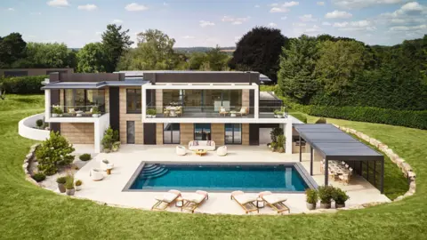 Omaze A large luxury house with a swimming pool in front. The property is surrounded by grass and trees in the background