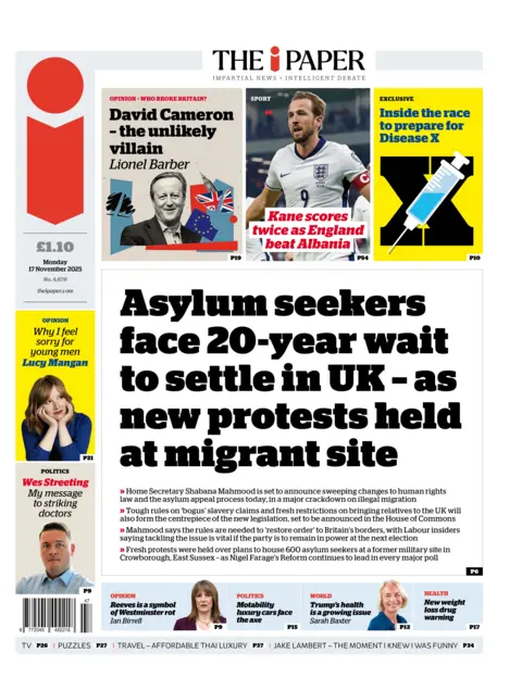 The headline on the front page of the i Paper reads: “Asylum seekers face 20-year wait to settle in UK - as new protests held at migrant site”.