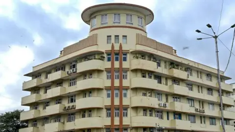 Getty Images An Art Deco apartment block on Mumbai's marine drive with a turreted rooftop typical of the style. 