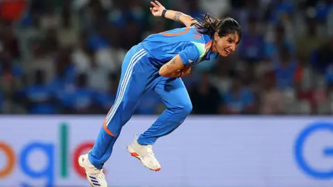 Alex Davidson-ICC/ICC via Getty Images  Renuka Singh of India bowls during the ICC Women's Cricket World Cup India 2025 match between India and New Zealand at DY Patil Stadium on October 23, 2025 in Navi Mumbai, India. (Photo by Alex Davidson-ICC/ICC via Getty Images)