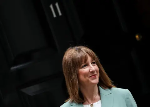 AFP via Getty Images Britain's Chancellor of the Exchequer Rachel Reeves leaves from 11 Downing Street in central London, on June 11, 2025, before heading to Parliament to present her Spending Review. 
