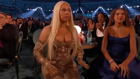 CBS Beyonce and Blue Ivy pictured as Cowboy Carter is named country album of the year