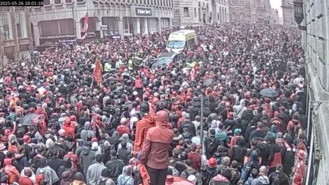 MerseysidePolice Screen grab taken from video footage issued by Merseyside Police dated 26/05/25 of Paul Doyle's car (top centre) being driven through crowd on Water Street