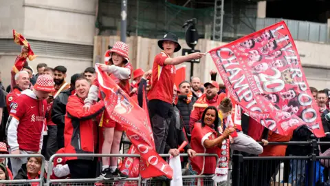 PA Media Liverpool fans during the Premier League winners parade in Liverpool.