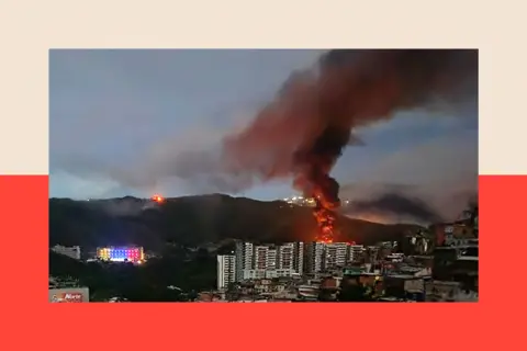 AFP via Getty Images Fire at Fuerte Tiuna, Venezuela's largest military complex, is seen from a distance after a series of explosions in the Venezuelan capital Caracas 