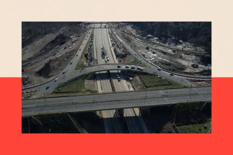 AFP via Getty Images An overhead view shows work ongoing at Junction 10 of the London orbital motorway the M25