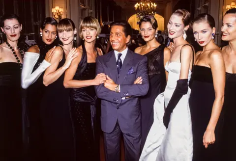 Getty Images Valentino Garavani and his models during the designer's Haute Couture Fall/Winter 1993/94 fashion show in Paris, France, July 1993.