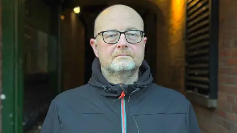 Barry Monteith has called for the lane to be adopted by the council