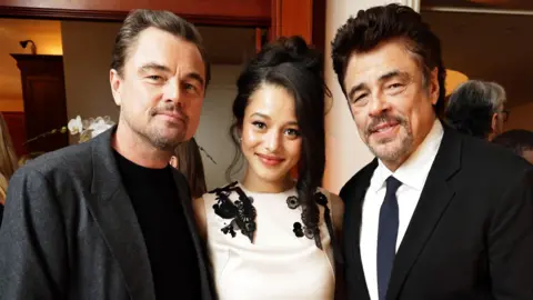 Getty Images Leonardo DiCaprio, Chase Infiniti and Benicio Del Toro seen at a Celebration in Honor of 'One Battle After Another' hosted by Mike and Irena Medavoy, Pam Abdy and Mike De Luca on December 04, 2025 in Los Angeles, California