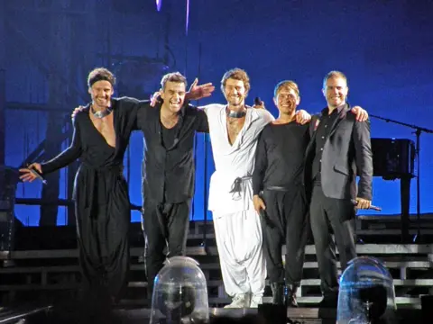 Getty Images Take That on stage in 2011