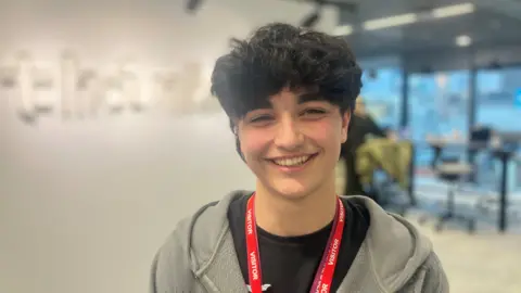 BBC Photograph of seventeen year-old Dylan Nomovi from Middleton He is pictured in an office in Manchester city centre.